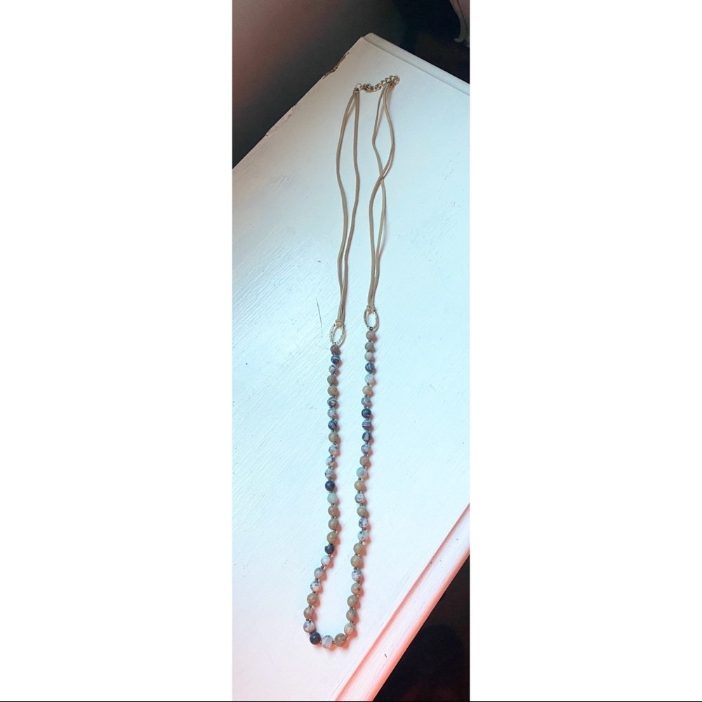Long, natural colored bead necklace
